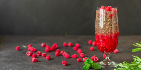 raspberry and chia seed pudding cocktail dessert (sweet drink, dessert snack). top food background. copy space