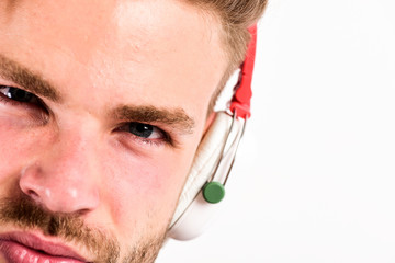 ebook and online education. music education. sexy muscular man listen ebook. man in earphones...