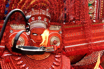 Theyyam is a popular ritual form of worship in Kerala, India,  - obrazy, fototapety, plakaty