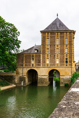 building of old water mill along river Meuse. Charleville Mezieres, France