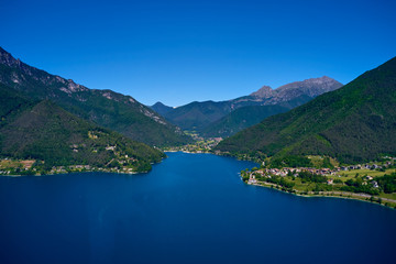 Obraz na płótnie Canvas Aerial photography with drone. Panoramic view of Lake Ledro in the north of Italy In the Alps.