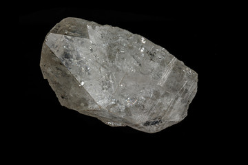 Macro mineral stone rhinestone, rock crystal on a black background