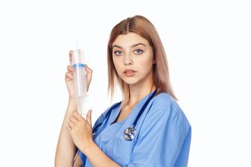 young female doctor with syringe