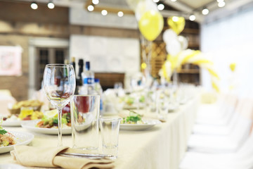 Glasses on the table in the restaurant. Table setting.