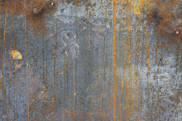 The texture is metallic. Industrial background from an old rusty metal. Textured metal background with rust and cracks.