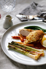 Roast dinner with chicken, baby leeks, carrots, green beans and potato mash