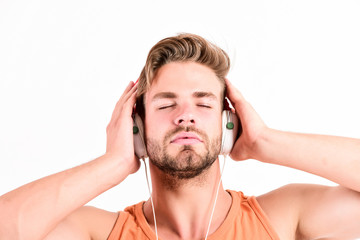 ebook and online education. music education. sexy muscular man listen ebook. man in earphones...