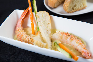 Scampi with mayonnaise and vegetables
