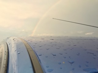 Fototapeta na wymiar airplane flying above clouds