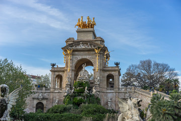 Fototapeta na wymiar Fountain, Golden horses and gargoyles in the Citadel Park, Located in the neighborhood of La Ribera, the Ciutadella Park is the largest park in Barcelona. Spain