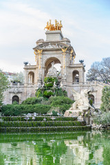 Fototapeta na wymiar Tourism, Golden horses and gargoyles in the Citadel Park, Located in the neighborhood of La Ribera, the Ciutadella Park is the largest park in Barcelona. Spain