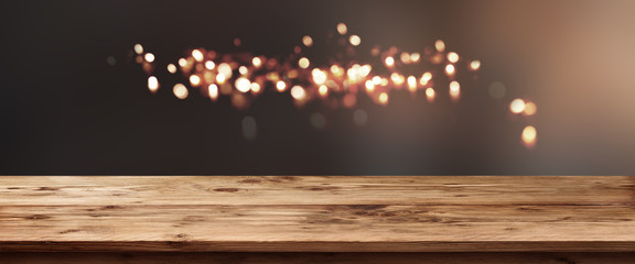 Lights in the dark with wooden counter