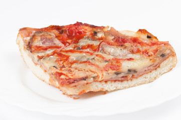 A delicious homemade pizza on a plate isolated on a white background