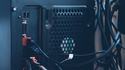 PC system unit. Computer hardware. Closeup of host controller interface, wire connection.