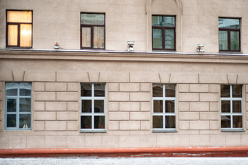 windows in a city brick building