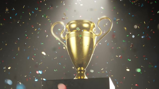 Golden metallic trophy cup on the platform in the colorful confetti rain. 4KHD