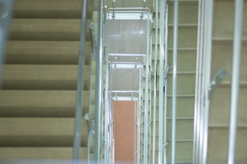 staircase with railings in the building