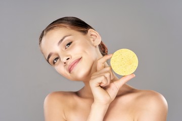 portrait of young woman with perfect skin of her face