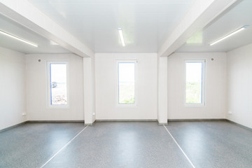Light white empty office room with bright lighting