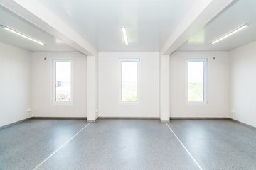 Light white empty office room with bright lighting