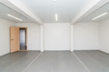 Light white empty office room with bright lighting