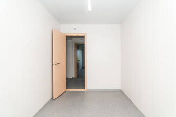 Light white empty office room with bright lighting