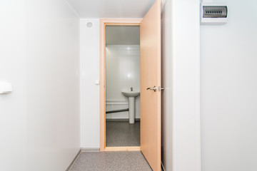 Light white empty office room with bright lighting