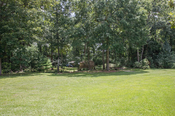 Large lush lot backyard of American house in the suburbs © Ursula Page