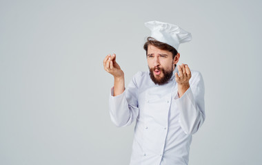 young chef showing ok sign