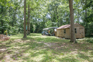 Large lush lot backyard of American house in the suburbs