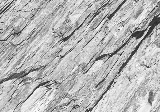 Rough layered white rock surface texture