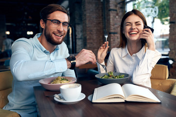 young couple having dinner in restaurant