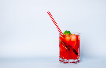 Cocktail, lemonade with peaches, mint leaves and ice, with copy space for your text.