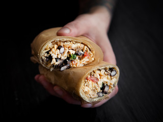 Burrito in hand.