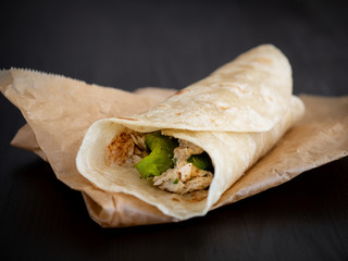 Burrito on a black backgroung