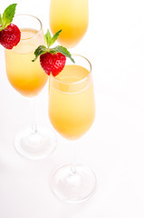 Glasses of wine and champagne with strawberry iIsolated on white background, close up. Party and holiday celebration. The buffet at the reception.