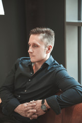 Fototapeta premium Business man in black shirt portrait