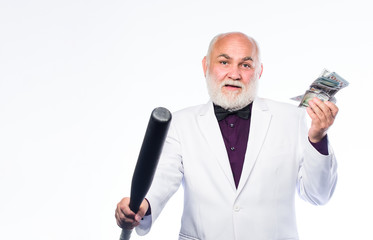 Naklejka premium mature bearded man with dollar banknotes and baseball bat. dirty business. successful businessman. Richness. criminal and robbery. debt pit. rich mature man has lots of money. Concept of dirty money