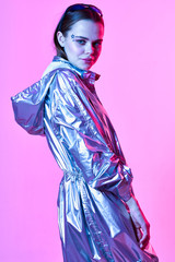Obraz na płótnie Canvas Glamorous woman silver jacket model