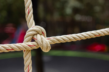 Closeup rope net for children toy in playground.