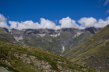 Fototapeta na wymiar Mountain landscape with cloudy sky, Italy