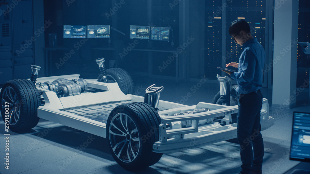 Poster automobile engineer working on electric car chassis platform, using tablet computer augmented realit