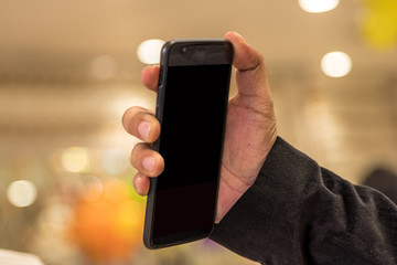 hand holding mobile smart phone