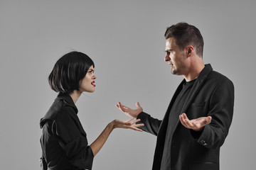 man and woman shaking hands