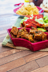 Traditional Indian food chicken tandoori and Tikka with garlic naan