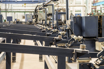 Machine for the production of spiral fin. Finned tube production. High frequency welding line.