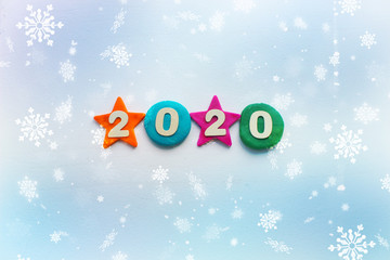 2020 background .The concept of the new 2020. New year with colorful numbers 2020 on white background. Christmas card, congratulations. Copy space.