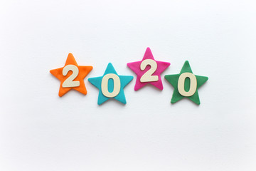 2020 background .The concept of the new 2020. New year with colorful numbers 2020 on white background. Christmas card, congratulations. Copy space.