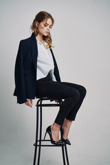 business woman sitting on a chair