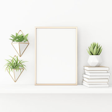 Interior poster mockup with vertical gold metal frame standing on the table with plants in pots and pile of books on empty white wall background. 3D rendering, illustration.
